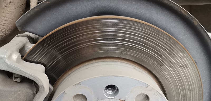 A severely worn brake disc